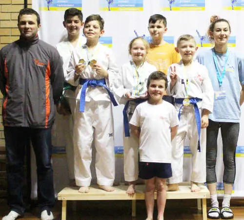 Matt sharing podium with athletes at Sydney Taekwondo Championships